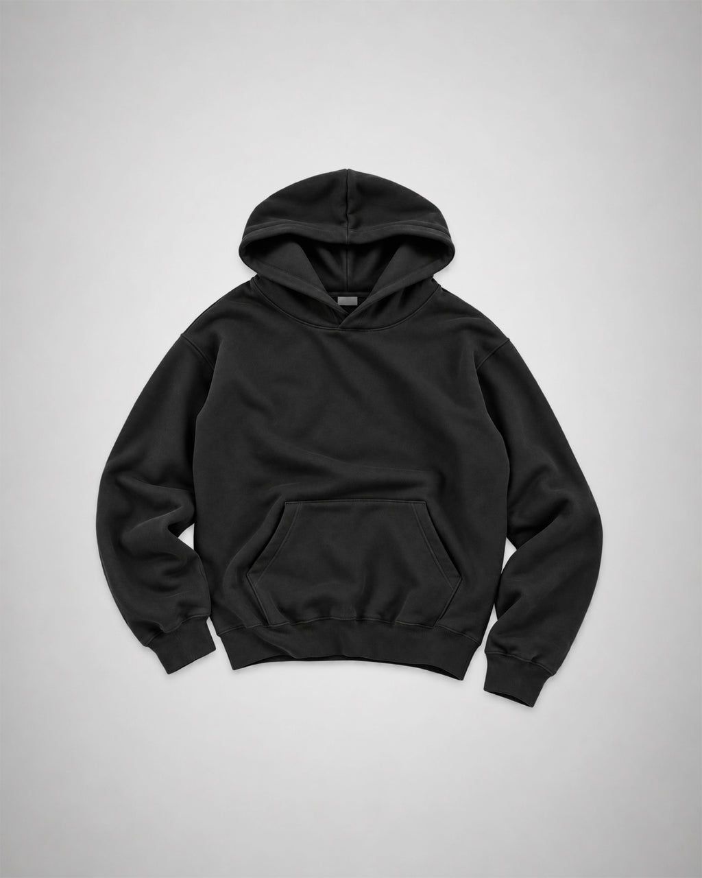 Front view of black COLORS+STUDIOS pullover hoodie with hood and kangaroo pocket.