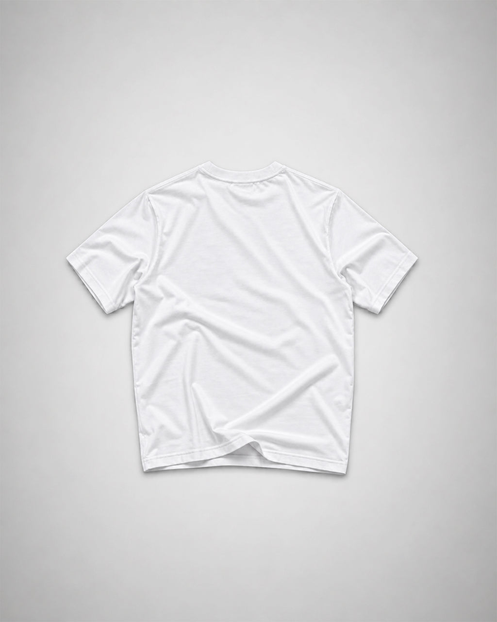 Back view of a plain white COLORS+STUDIOS T-shirt with a clean, minimal design.